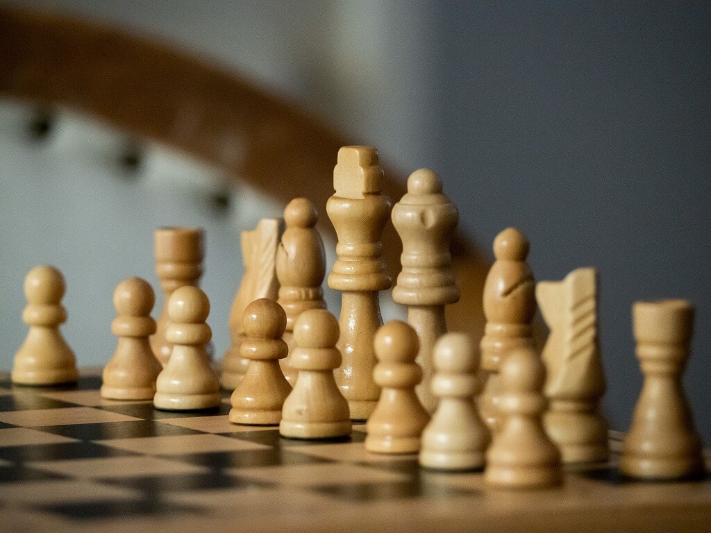 Chess pieces on a chess board to highlight moves toward being a lovable woman.