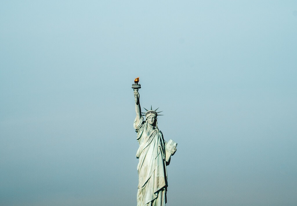 To save the marriage of Red and Blue, the Statue of Liberty, in the photo, stands as a beacon for America to stay united.