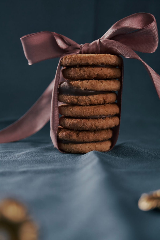 Our identity is the gifts we give the world and in this photo we see a generous stack of delicious cookies tied up with a satin bow, ready to give as the gift.